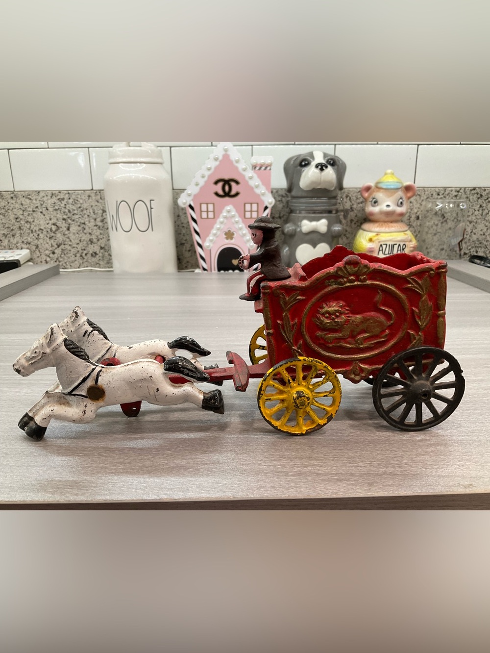 VINTAGE CAST IRON CIRCUS DRIVER WITH TWO HORSES